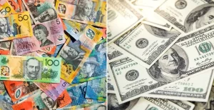 AUDUSD - The image shows Australian dollar notes beside U.S. dollar bills