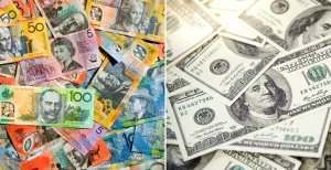 AUD USD - The image shows Australian dollar notes beside U.S. dollar bills